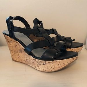Black faux leather wedge